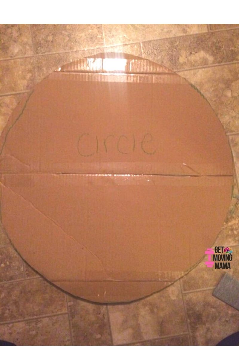 A picture of a circle cut out to use for a diaper cake base to make a diaper cake for a baby shower.