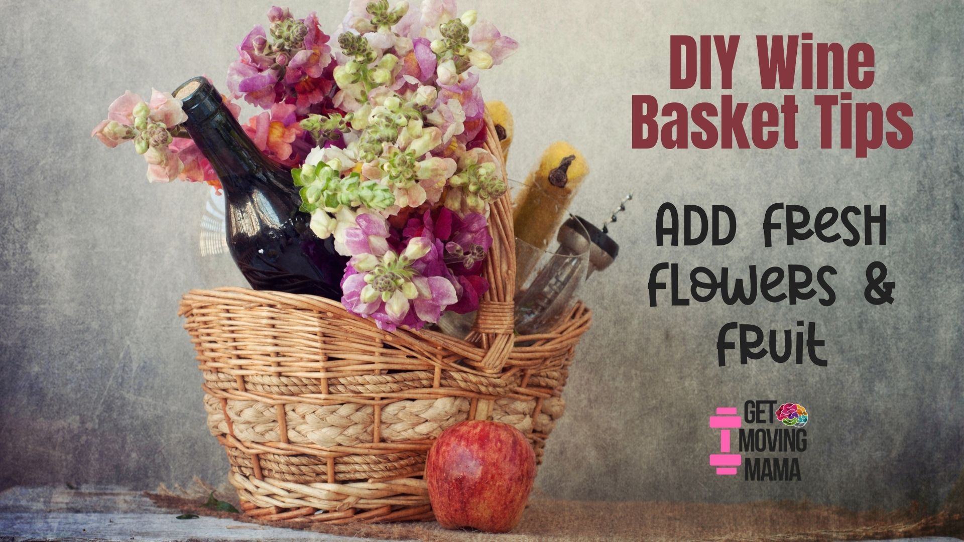 A picture of a wine basket with fresh flowers and fruit.
