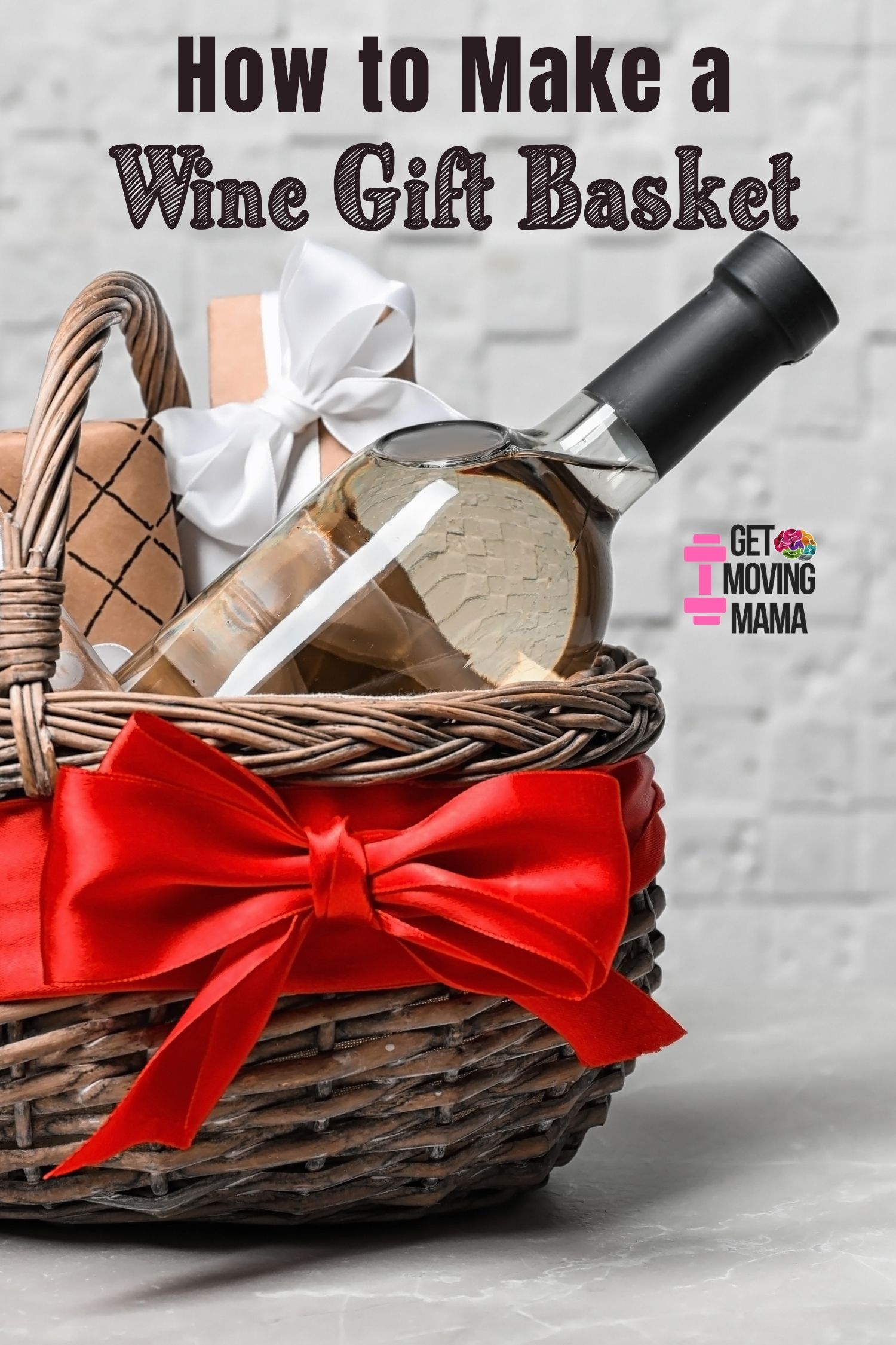 A picture of a wedding wine gift basket with a red bow on it.