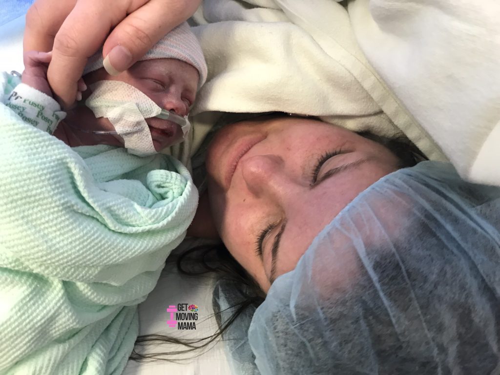 A picture of a mom and a baby after c-section delivery.